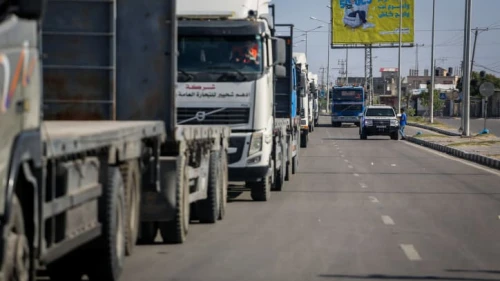 Trucks with humanitarian aid for Palestinian civilians arrive at the Gaza side of the Rafah border crossing with Egypt, Oct. 21, 2023. Photo by Atia Mohammed/Flash90.