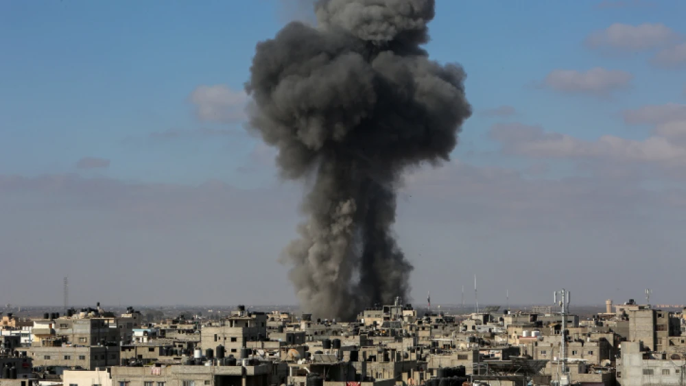 Smoke billows after an Israeli airstrike on the city of Rafah, in the southern Gaza Strip, on May 13, 2021. Photo by Atia Mohammed/Flash90.