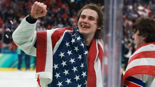 Jack Hughes, No. 86, of Team United States celebrates after a gold-medal win in the men's ice-hockey match between Canada and the United States on day 16 of the Milano Cortina 2026 Winter Olympic Games in Italy, Feb. 22, 2026. Photo by Elsa/Getty Images.