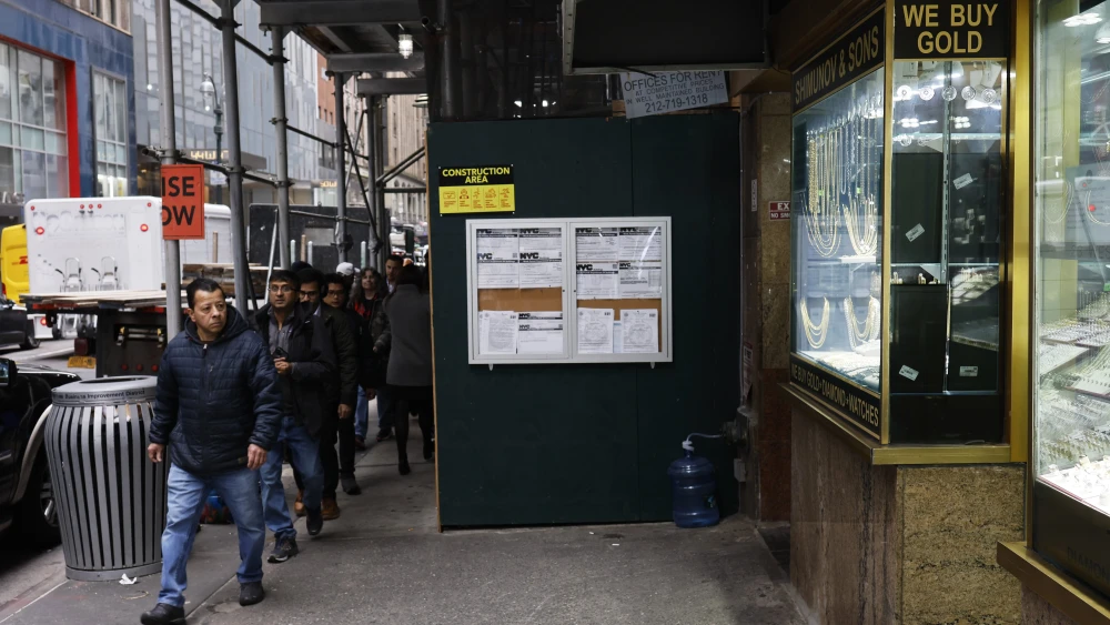 A "We Buy Gold" sign is displayed at a jewelry store in the Diamond District on Dec. 4, 2023 in New York City. Photo by Michael M. Santiago/Getty Images.