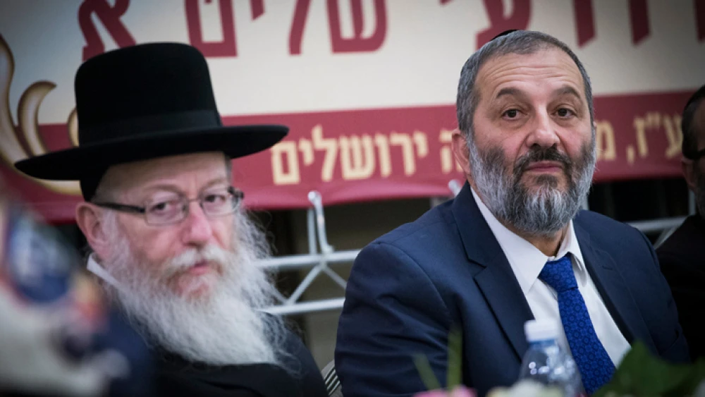 UTJ Party head Yaakov Litzman (left) and Shas Party leader Aryeh Deri attend a conference at the Ramada Jerusalem Hotel on Feb. 16, 2017. Photo by Yonatan Sindel/Flash90.