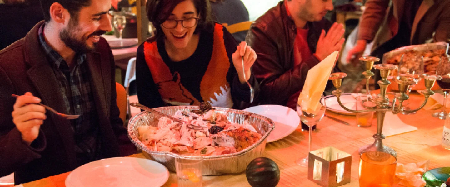 Israelis and Americans enjoy a Thanksgiving dinner together in Tel Aviv on Nov. 29, 2014. Photo by Danielle Shitrit/Flash90.