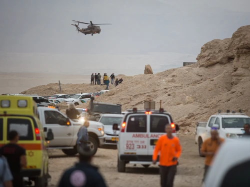 Rescue forces near the scene where young Israelis were swept in the flooding of the Tzafit Stream near the Dead Sea on April 26, 2018. Heavy rainfall caused flooding across the desert, causing many streams to overflow. Photo by Hadas Parush/Flash90.