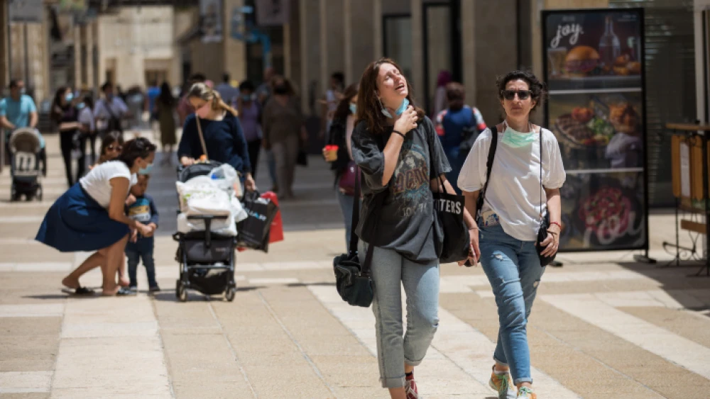 People walk at the Mamilla Mall near Jerusalem's Old City on May 3, 2020. Photo by Nati Shohat/Flash90.