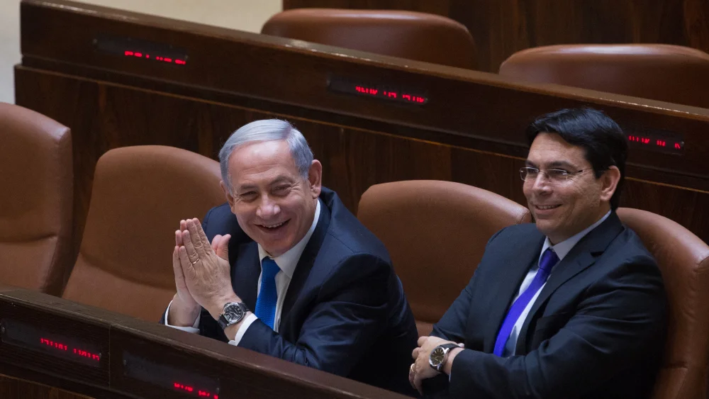 Israeli Prime Minister Benjamin Netanyahu (left) and Science, Technology and Space Minister Danny Danon, now Israel’s ambassador to the United Nations, during a Knesset plenum session in Jerusalem on June 17, 2015. Credit: Miriam Alster/Flash90.