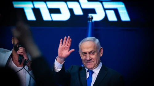 Israeli Prime Minister Benjamin Netanyahu waves to supporters on the night of the Israeli elections at Likud Party headquarters in Tel Aviv, March 2, 2020. Photo by Olivier Fitoussi/Flash90.