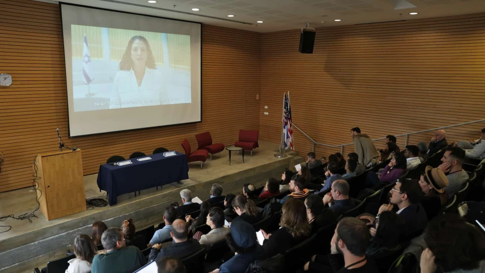 Shira Ruderman, executive director at the Ruderman Family Foundation, addresses the symposium. Photo by Yaniv Kopel.