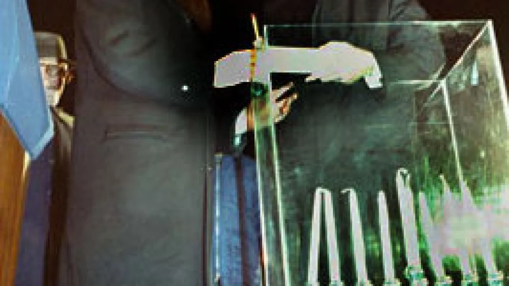 U.S. President Jimmy Carter kindled the first national menorah outside the White House in 1978—a tradition that has taken place ever since. Credit: Wikimedia Commons.