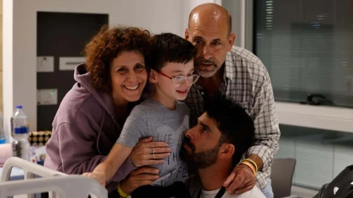 Ohad Monder, 9, reunites with his father and brother after 49 days in Hamas captivity in the Gaza Strip, Nov. 25, 2023. Credit: Schneider Children's Hospital.