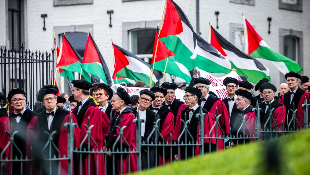 Dutch professors take part in a procession for Maastricht University's 50th anniversary as anti-Israel activists protest in solidarity with Palestinians, Jan. 23, 2026. Photo by Rob Engelaar/ANP/AFP via Getty Images.