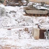 Israeli soldiers seen in the snow on the Israeli border with Lebanon, on Feb. 24, 2025. Photo by Ayal Margolin/Flash90.