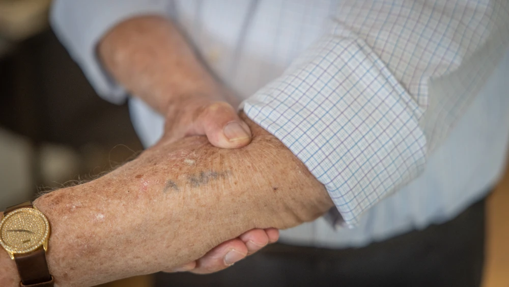 Holocaust survivor Jerry Stein, who survived the Auschwitz concentration camp and immigrated to Israel this year from the United States, is photographed at his home in Jerusalem ahead of his 97th birthday this week, Feb. 18, 2026. Photo by Chaim Goldberg/Flash90.