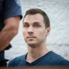 Aleksey Burkov, a Russian IT specialist and alleged hacker wanted by the United States, arrives for a court hearing at the Supreme Court in Jerusalem on Nov. 3, 2019. Photo by Yonatan Sindel/Flash90.