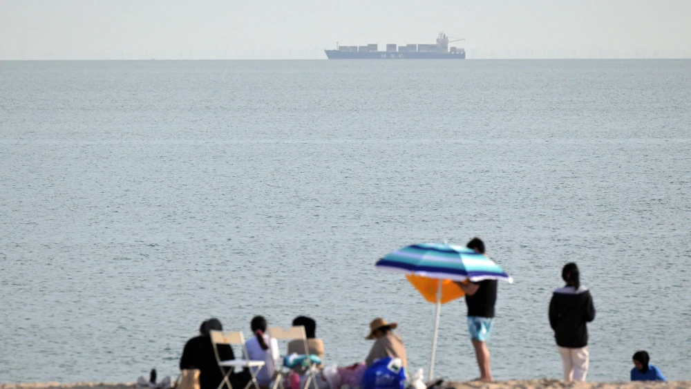 A cargo ship of the Mediterranean Shipping Company (MSC) sails in the Gulf waters off Kuwait City on April 24, 2026. Photo by Yasser Al-Zayyat / AFP via Getty Images.
