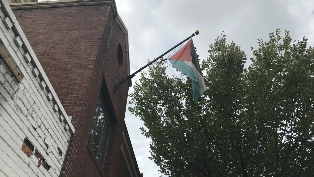 The Palestinian flag moments before being taken down from the PLO Mission in Washington in advance of its being ordered closed by the Trump administration, Oct. 10, 2018. Credit: Jackson Richman/JNS.