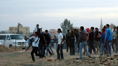 Click photo to download. Caption: On Nov. 30, 2013 in the southern Israeli town of Hura, demonstrators protest the Israeli government's "Prawer Plan" to resettle Bedouin residents of the Negev desert. The fate of the plan, which continued to be discussed by Israeli Knesset members after its apparent cancelation Dec. 12, remains a mystery. Credit: Flash90.