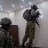 Israeli soldiers map the home in Nablus of Muad Masri, one of the Hamas terrorists who murdered three members of the Dee family, June 13, 2023. Credit: IDF.
