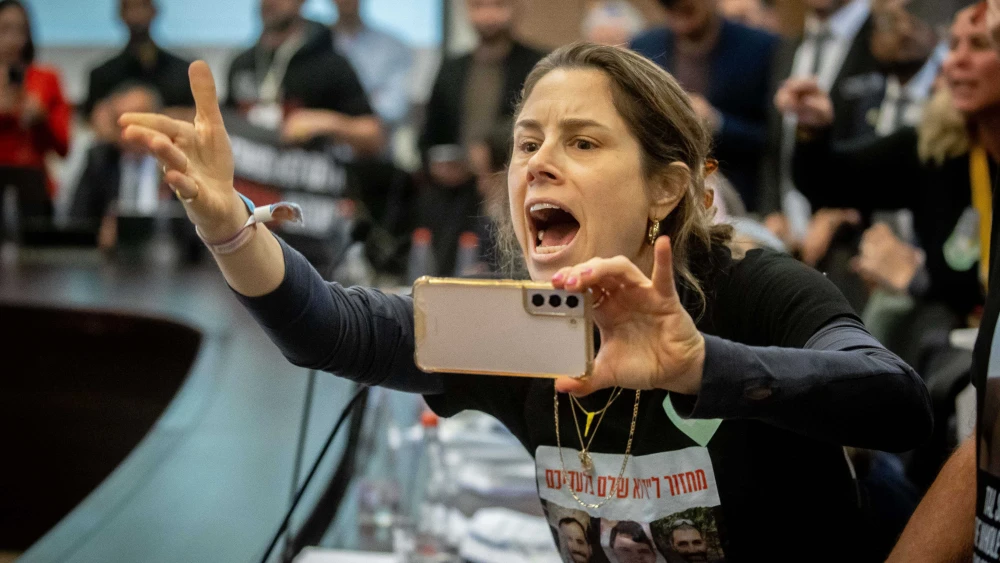 Israelis who's family members are held hostage by Hamas terrorists in Gaza protest during a Finance committee meeting, in the Knesset, the Israeli parliament in Jerusalem on January 22, 2024. Photo by Oren Ben Hakoon/Flash90 *** Local Caption *** ועדת כספים כספים כנסת יו"ר ועדת כספים משפחות חטופים