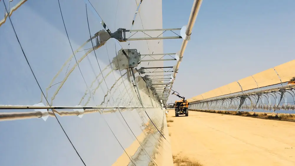 A machine cleaning the parabolic mirrors at the Ashalim Solar Thermal Power Station. Credit: Courtesy.