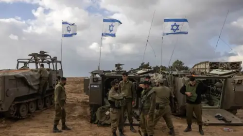 Israeli soldiers and armored personnel carriers near the Gaza border, Nov. 20, 2023. Photo by Chaim Goldberg/Flash90.