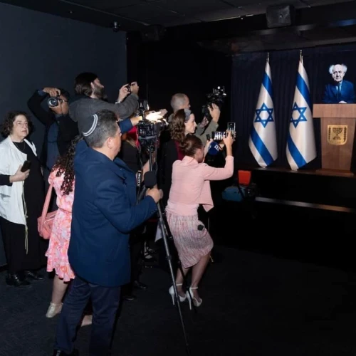 Visitors photograph the hologram of David Ben-Gurion, Israel's first prime minister, at the Friends of Zion Museum, Jan. 7, 2026. Credit: FOZ.