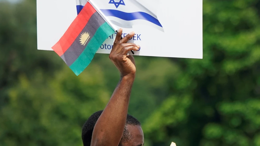 A spectator with a sign at the “No Fear: A Rally in Solidarity With the Jewish People” on the National Mall in Washington, D.C., on July 11, 2021. Credit: Chris Kleponis.