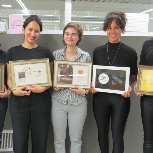 Students from the University of Haifa's Innovation Hub for Holocaust Education and Commemoration pose with plaques describing their individual projects. Credit: University of Haifa.