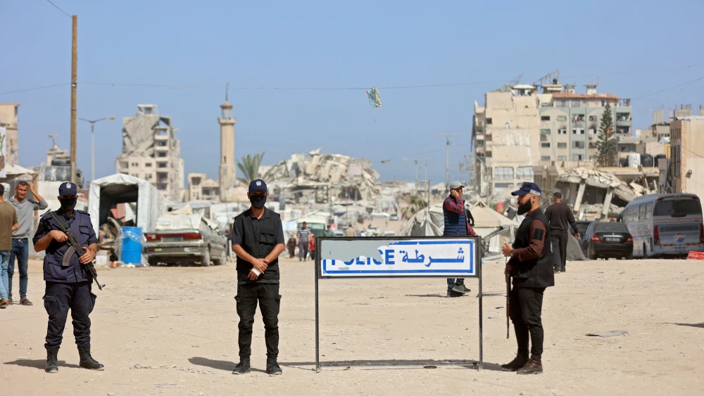 Palestinian militant group Hamas police officers stand guard at Al-Azhar University in Gaza City on May 14, 2026. Photo by Omar Al-Qattaa/AFP via Getty Images.