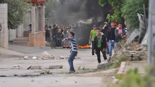 File photo: Palestinian rioters hurl rocks and firebombs at Israeli security forces in El-Arrub, southwest of Bethlehem. Credit: Israel Defense Forces.