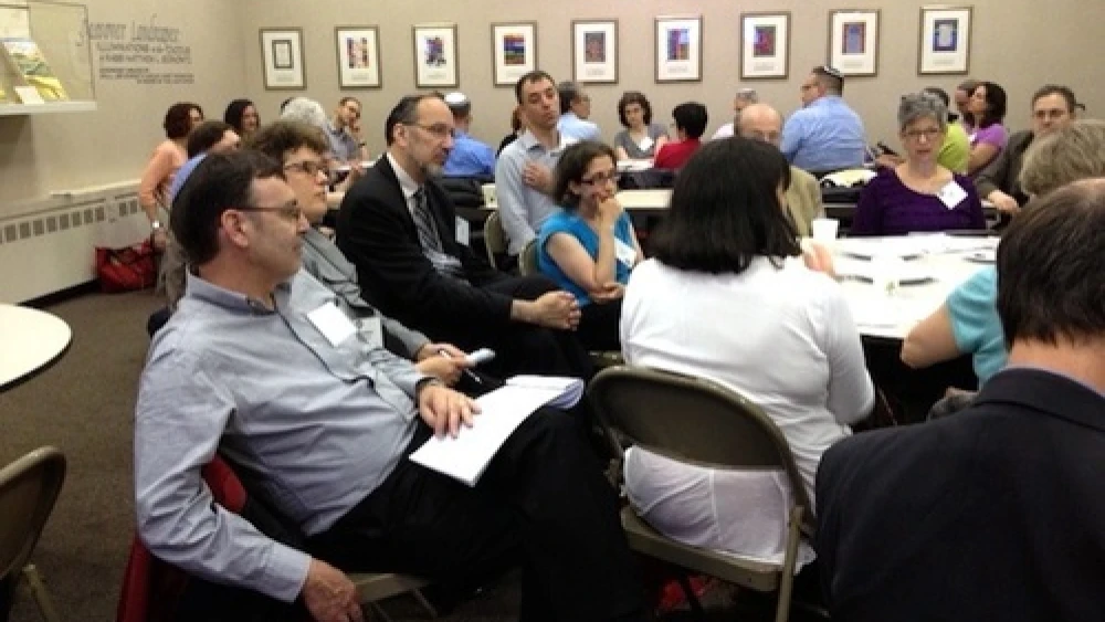 Participants at the Network for Research in Jewish Education conference discuss Consortium for Applied Studies in Jewish Education research agendas around Jewish educational leadership, Israel education and the sustainability of Jewish education, June 3, 2013. Credit: Wendy Rosov.