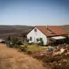 A house in the Israeli outpost of Esh Kodesh near Shiloh in the Binyamin Region, July 20, 2015. Photo by Garrett Mills/Flash90.
