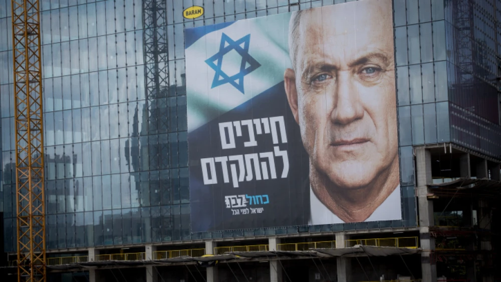 A Blue and White Party campaign poster bearing an image of party head Benny Gantz is seen in Tel Aviv on Jan. 22, 2020. Photo by Miriam Alstre/Flash90.