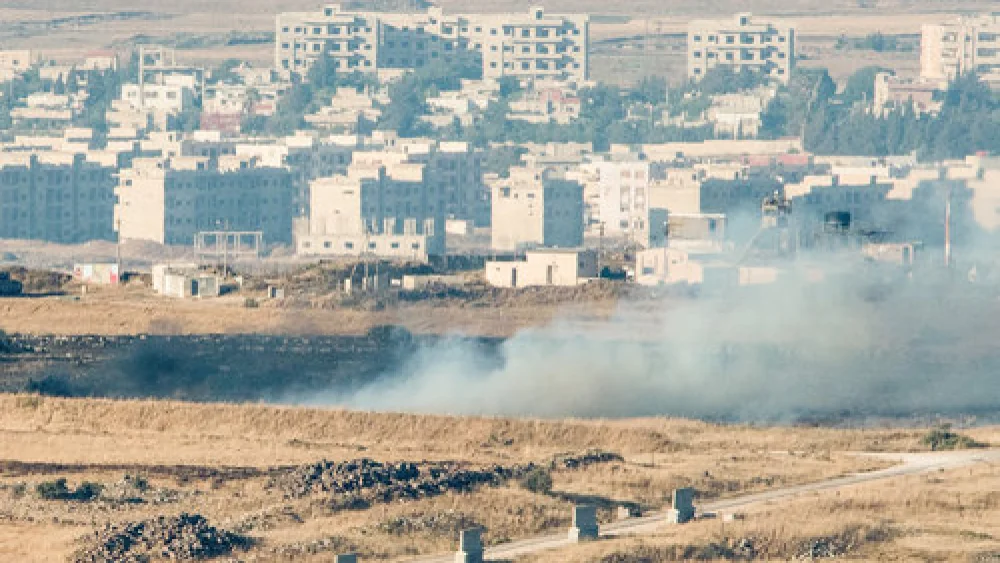 Smoke rises in Syria near the Israeli-Syrian border June 24, 2017. Credit: Basel Awidat/Flash90.