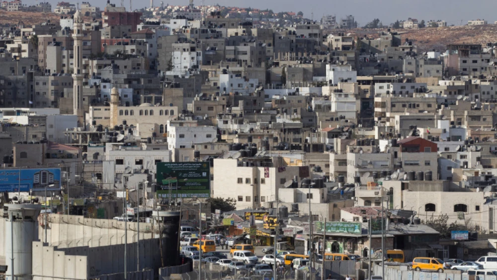 A view of the separation wall and checkpoint in the West Bank city of Kalandia, near Ramallah. Sept. 29, 2014. Photo by Miriam Alster/Flash90.