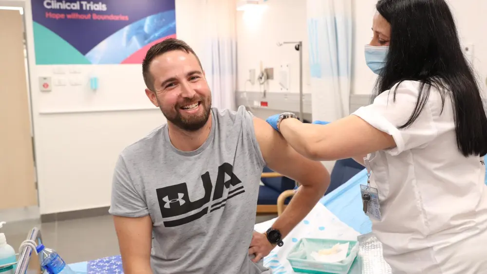 Nurse Hela Litwin administers Israel's first coronavirus vaccine, BriLife, to volunteer Segev Harel at Sheba Medical Center at Tel Hashomer in Ramat Gan in Nov. 1, 2020. Credit: Israeli Defense Ministry Spokesperson's Office.