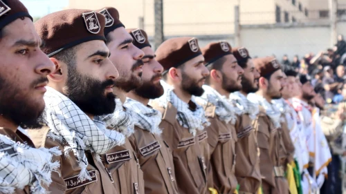 Hezbollah terrorists at a funeral for a slain comrade in Jwaya, Lebanon, April 17, ‎2024, Photo by mohammad kassir/Shutterstock.