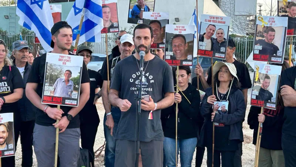 Daniel Lifshitz, whose grandfather Oded is a hostage in Gaza, speaks at the protest, Feb. 28, 2024. Credit: The Hostage and Missing Families Forum.