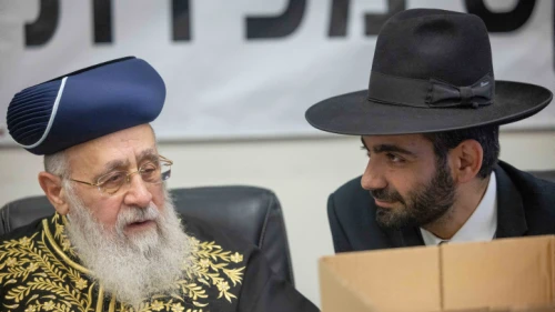 Sephardic Chief Rabbi Yitzhak Yosef (left) with Religions Services Minister Michael Michieli at a ceremony in Jerusalem selling the state's chametz, April 4, 2023. Photo by Yonatan Sindel/Flash90.