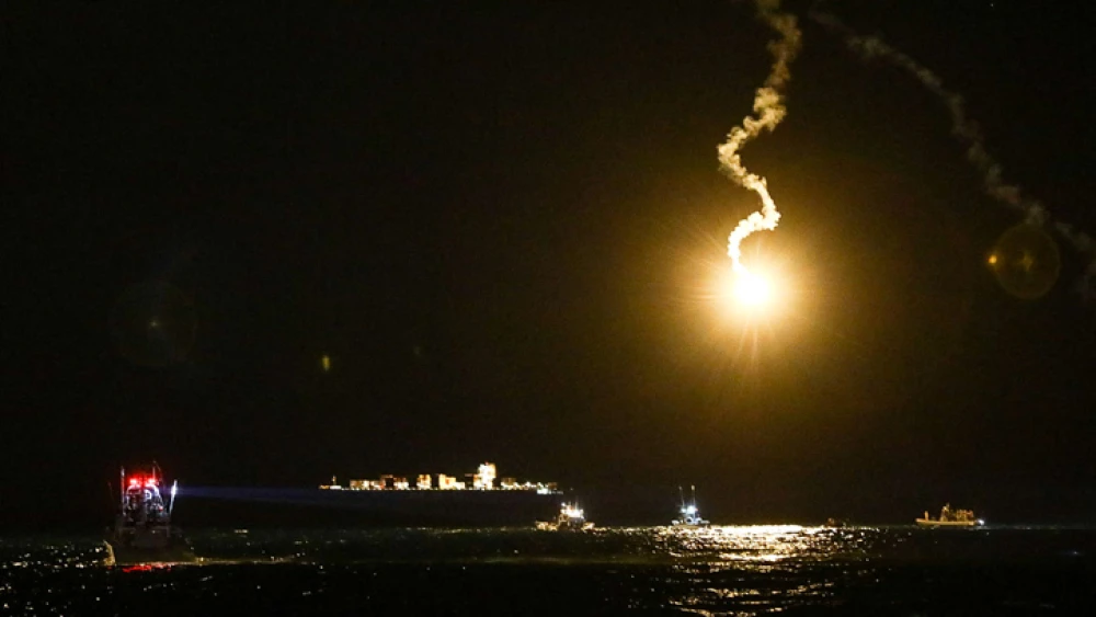 An Israeli army flare illuminated the sky during searches for survivors after a helicopter crashed off the coast of the northern Israeli city of Haifa on Jan. 4, 2022. Photo by Shir Torem/Flash90.