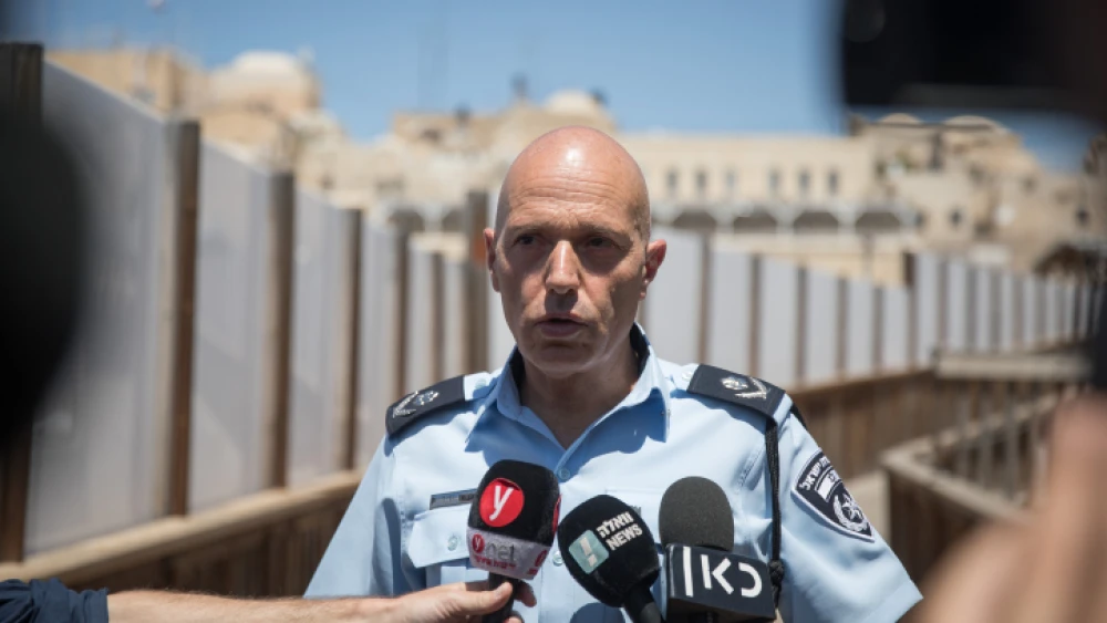 Jerusalem District Police Commander Doron Yedid speaks with media at the Mughrabi Bridge in the Old City of Jerusalem after clashes broke out on the Temple Mount, on Aug. 11, 2019. Photo by Hadas Parush/Flash90.