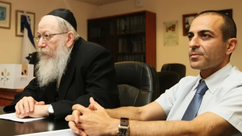 Then-Deputy Health Minister Yaakov Litzman (left) and Health Ministry Director-General Ronni Gamzu attend a press conference at the Health Ministry in Jerusalem on Aug. 7, 2011. Photo by Kobi Gideon/Flash90.
