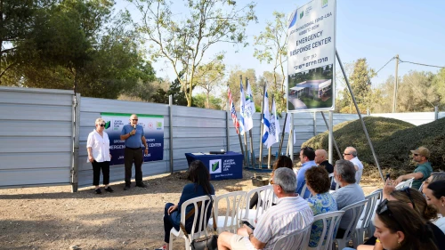 Philanthropists Michael and Janet Kass of Tampa, Fla. address the Jewish National Fund-USA groundbreaking ceremony for a new emergency response center at Kibbutz Re'im, Nov. 5, 2024. Photo by Ron Rahamim.