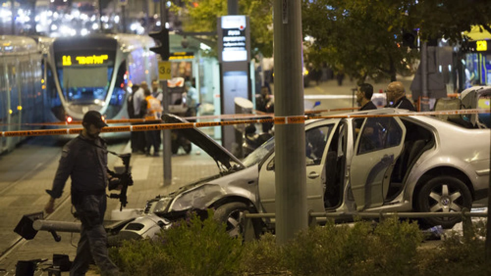 The scene of a car crashing into Jerusalem's Ammunition Hill light-rail station in a Palestinian terrorist attack on Oct. 22, 2014. Photo by Flash90.