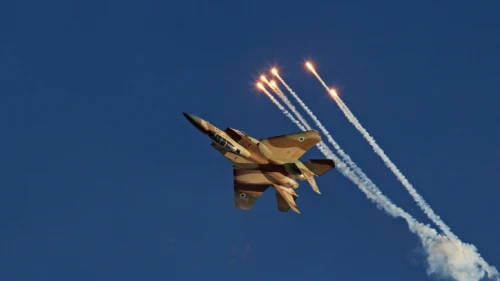 Aerobatic display of the F-15 fighter jet named as Ra'am, Hebrew for "Thunder," during the IAF (Israeli army Air Force) flight course 166 graduation ceremony in the Hatzerim Air Base in the Negev Desert on June 23, 2013. Photo by Ofer Zidon/Flash90.