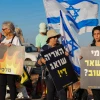 Demonstrators protest against the Israeli government at the Amiad Junction, north of the Sea of Galilee, July 6, 2024. Photo by Ayal Margolin/Flash90.