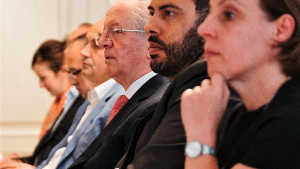 From left: Former Kosovo Prime Minister Avdullah Hoti (light-blue suit), Kosovar Foreign Minister Skënder Hyseni, director of the Office of Economic Growth at USAID Joshua Mike and Kosovo Minister of Foreign Affairs and Diaspora Donika Gërvalla-Schwarz the inaugural event of the Kosovo-Israel Chamber of Commerce in the capital of Pristina on June 29, 2022. Credit: Courtesy.
