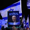 Supporters of Israeli Prime Minister Benjamin Netanyahu show their support near the Supreme Court in Jerusalem, Dec. 11, 2019. Photo by Olivier Fitoussi/Flash90.