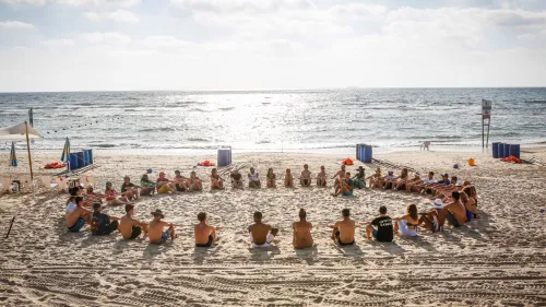 Emerging REALITY group participating in team building activities on Banana Beach in Michmoret. Credit: Schusterman Family Foundation.