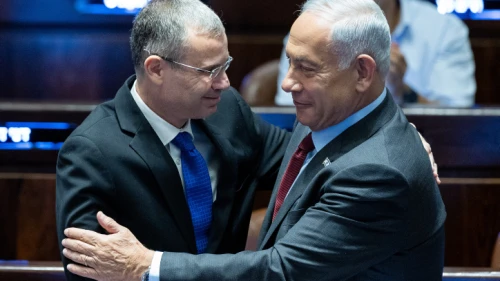 Knesset Speaker Yariv Levin, soon to be justice minister, and incoming Prime Minister Benjamin Netanyahu speak at the legislature in Jerusalem, Dec. 13, 2022. Photo by Yonatan Sindel/Flash90.