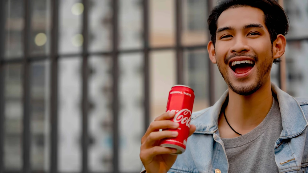 Man Drinking Coca-Cola